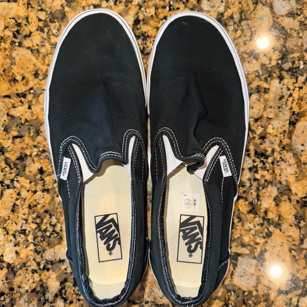Vans Black & White Slip-On Sneakers